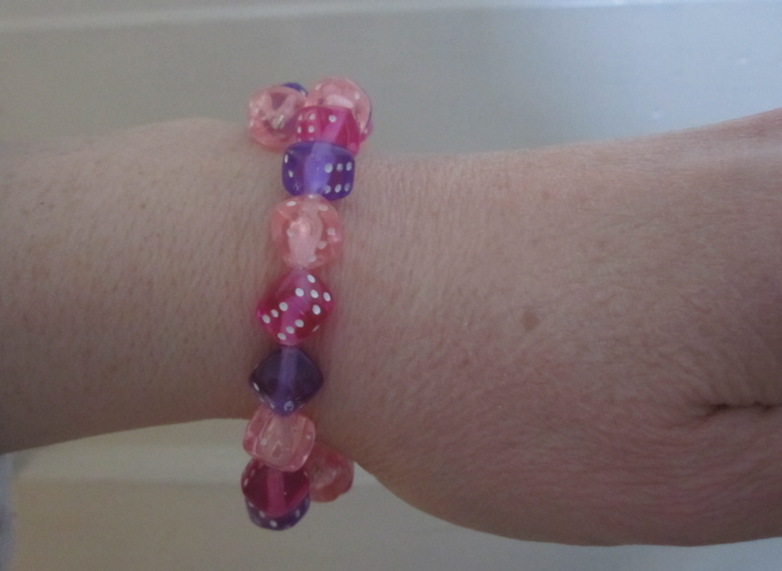 Pink and purple dice memory wire bracelet