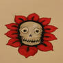 tattoo skull...flower...thingy