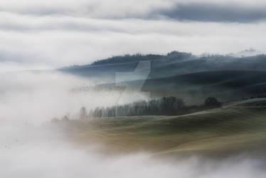 Fog on the valley fields Val d'Orcia