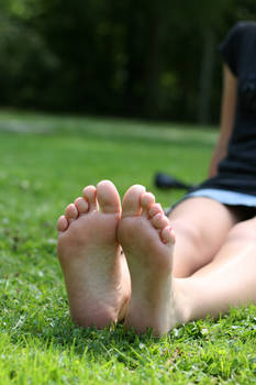Close to her feet