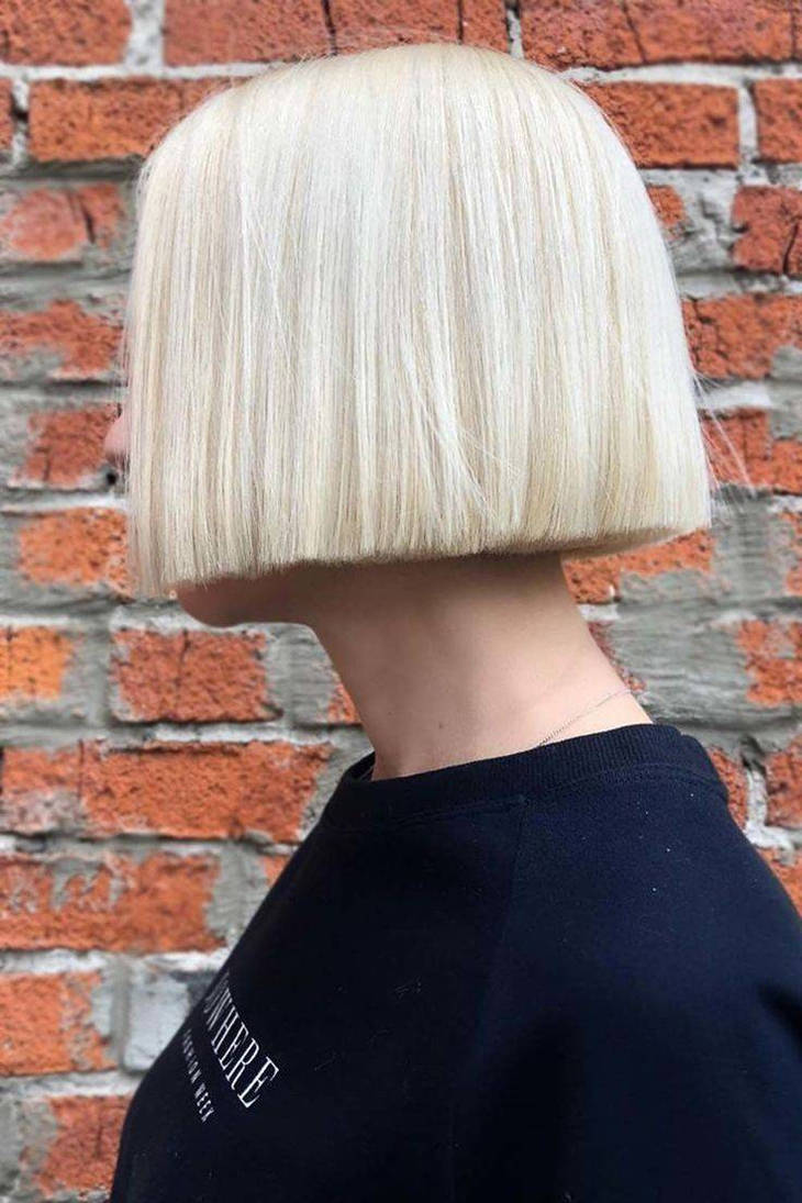 Image of Blunt platinum bob with a pompadour