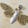 silver cicada with circuit