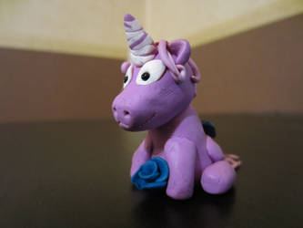 Violet Unicorn with blue rose