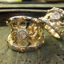 Knight and Dame gold wedding rings