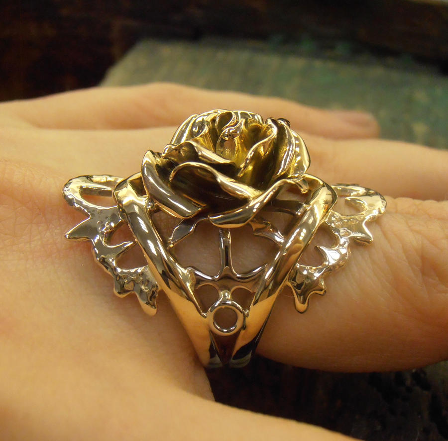 Rose ring with anchors and thorn wings