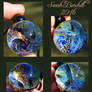 Wondrous World glass orb pendant