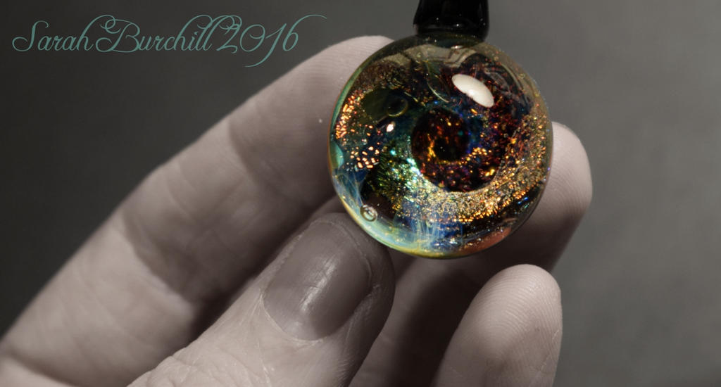 Galaxy pendant ''Carousel'' by fairyfrog
