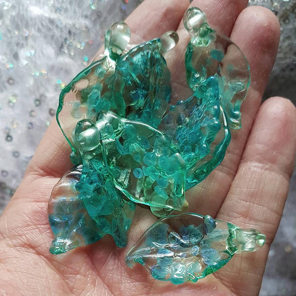 Handful of glass leaf by WeirdWondrous