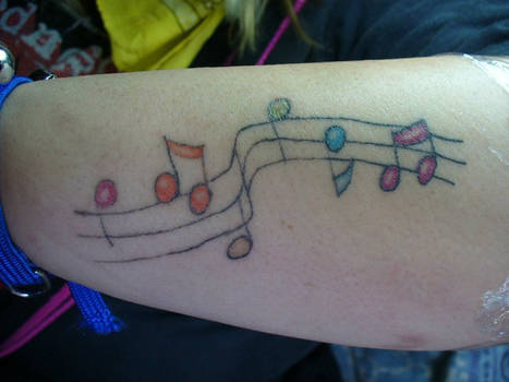 rainbow music notes tattoo