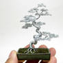 Wire bonsai tree with contorted trunk