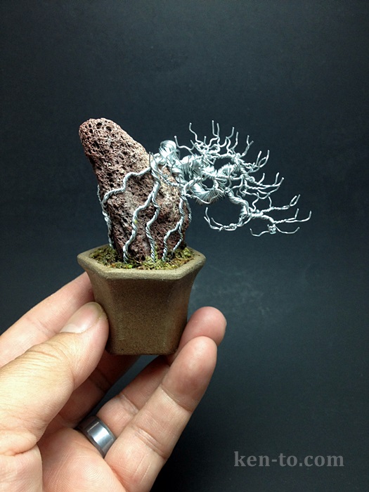 Root-over-rock wire bonsai tree by Ken To