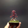 Red hematite wire bonsai tree sculpture by Ken To