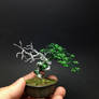 Small green deadwood wire bonsai tree by Ken To