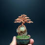 Root-over-rock wire bonsai tree by Ken To