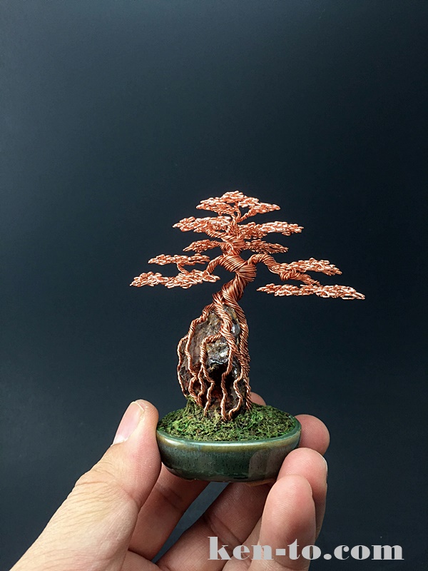 Root-over-rock wire bonsai tree by Ken To