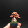Tiny root-over-rock wire bonsai by Ken To