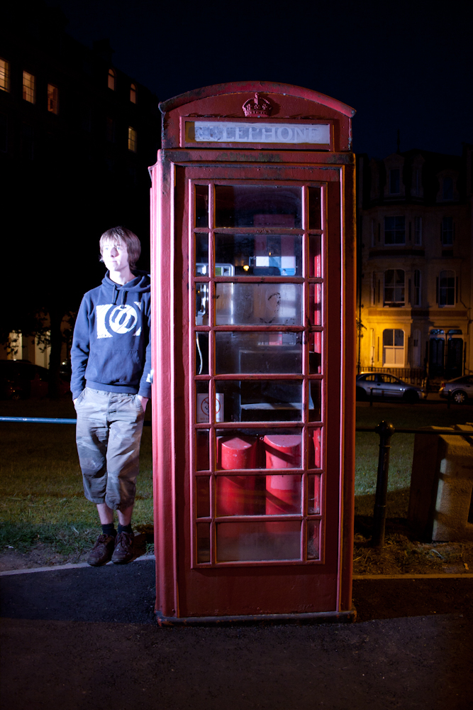 Tom With Bright Telephone Box