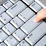Finger Pressing Keyboard Button