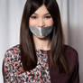 Gemma Chan gagged