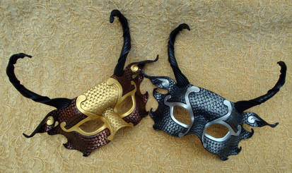 Pair of Half Dragon Masks