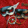 Two Small Leather Dragon Masks