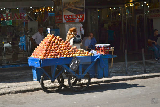 Woman Selling Peaches