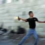 Teenage Boy Throwing Molotov