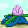 Ivysaur laying on a beach