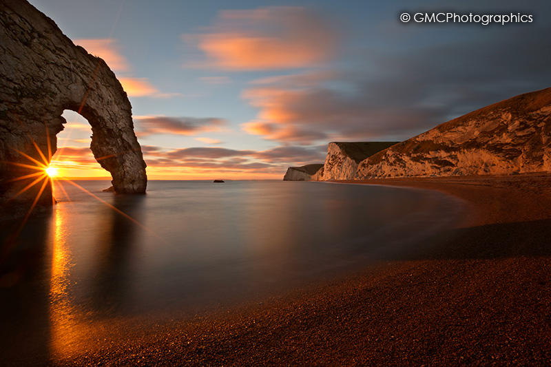 Durdle Door Sun Star by GMCPhotographics