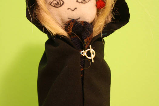 Luna Lovegood with cloak