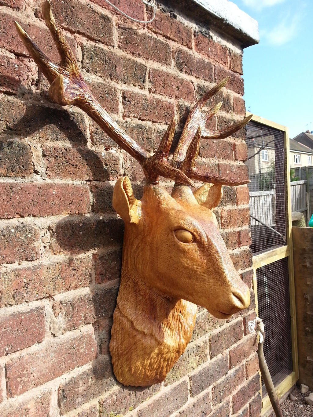 stag head wood sculpture by simon patel