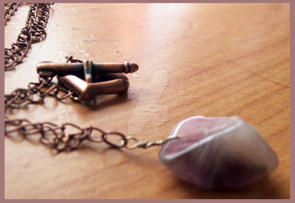 Necklace : purple stone.