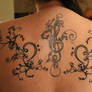 Treble and bass clef tattoos