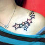 star tattoo on shoulder