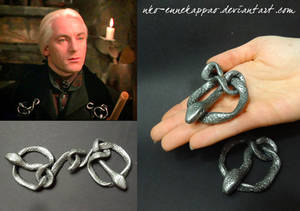 Lucius Malfoy's snake brooch
