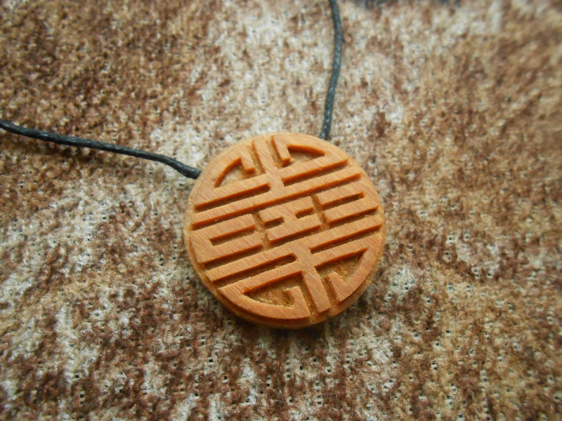 Shou amulet