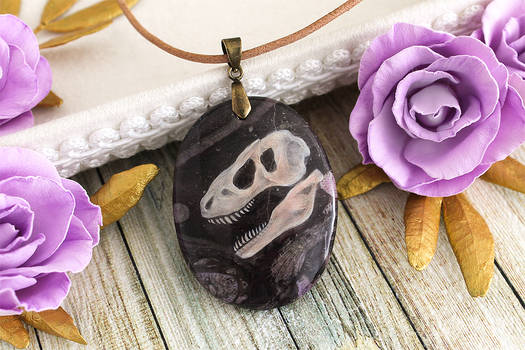 Tyrannosaurus skull - hand painted stone pendant