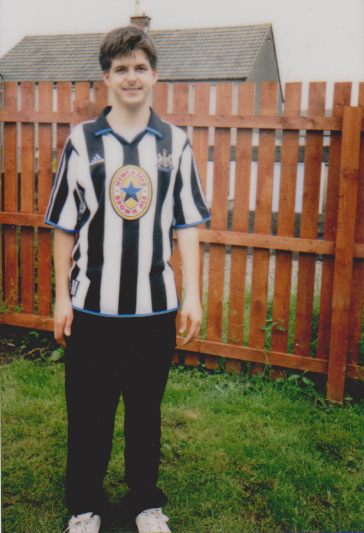 me in Newcastle United footie shirt