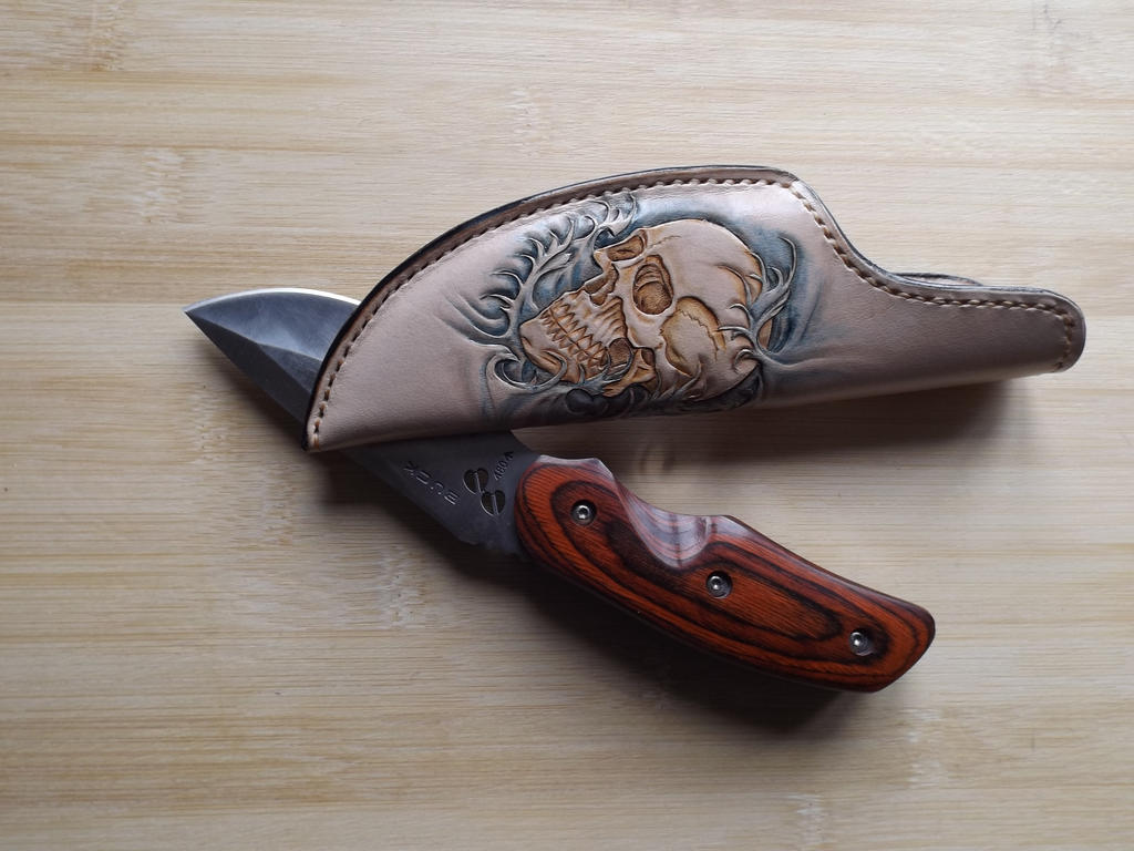 tooled leather knife sheath with skull