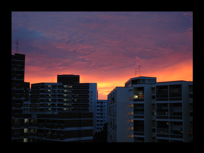 Buildings and a sunset