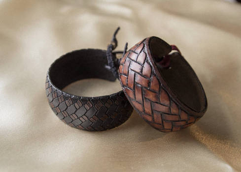 Snakeskin and braided bracelets