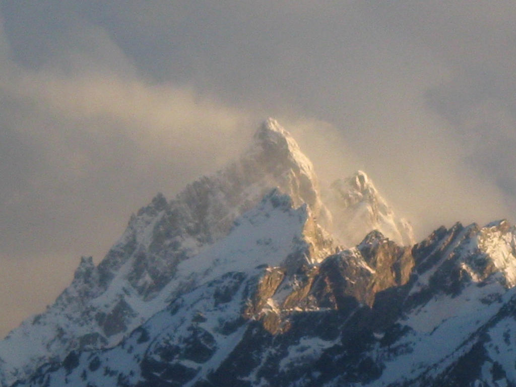 Snow Blowing Off a Mountain