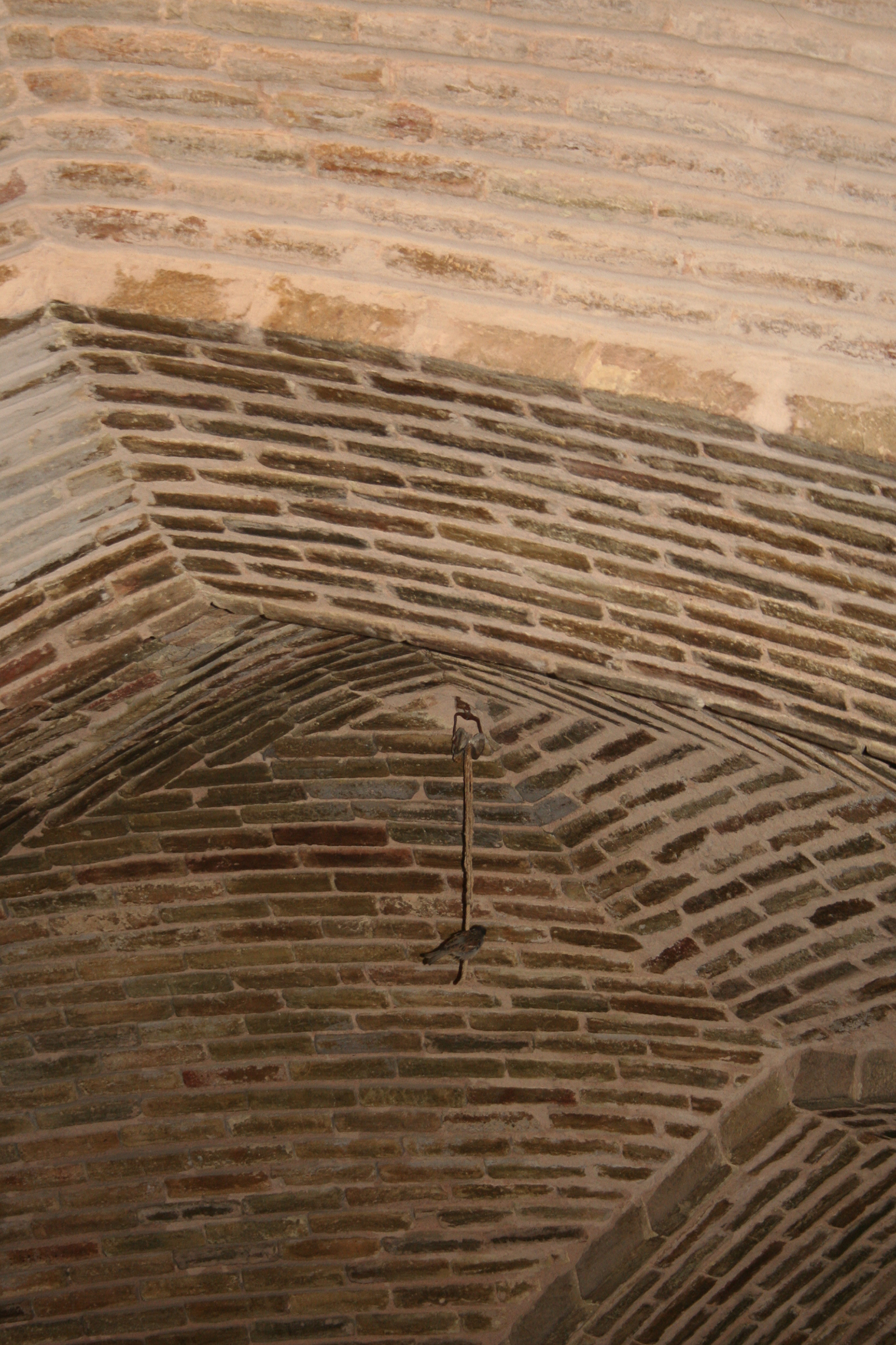 Stonebuilt ceiling with small bird