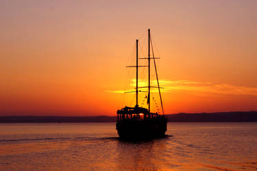 Dawn behind Lake and Boat - Photography