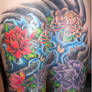 Japanese Flowers and waves tattoo
