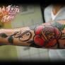 Lettering with rose tattoo