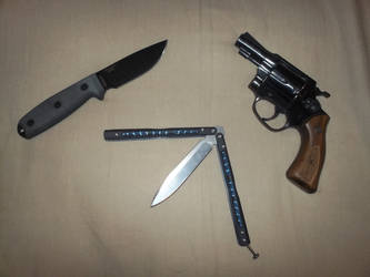 typical gun and knives photo