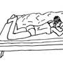 Woman reading on a bed