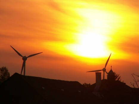 windmills on sundown