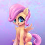 cute pony Fluttershy Filly is sitting